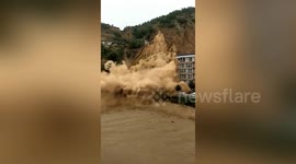 Massive landslide crashes down mountainside in northern China