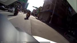 IDIOT ON THE ROAD: Moped rider indicates right to take a turn, but turns left causing a collision (Dashcam Video)