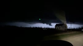 Lightning and thunder as funnel cloud forms over Mahnomen County, Minnesota