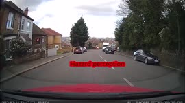 Kids run out from behind a bus without looking, forcing learner car to do an emergency stop