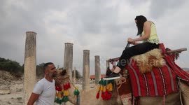 Palestinians visit the Roman basilica and forum in the village of Sebastia near the West Bank city of Nablus