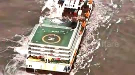 Helicopters used to rescue boat crew stranded out at sea due to Typhoon Kompasu in southern China