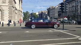 Queen's convoy drives around Parliament Square for British Legion remembrance