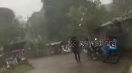 Strongs winds almost blow away roofs in the Philippines during tropical storm Kompasu