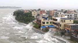 Massive waves slam coast as Typhoon Kompasu approaches southern China