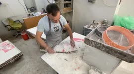 Palestinian man prepares a traditional sweets 