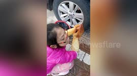 Girl scratches father’s car after using stainless steel scourer to help wash the vehicle