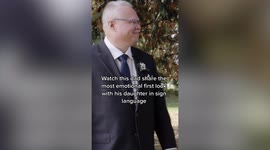 Tear-jerking moment deaf father sees daughter's wedding dress for the first time