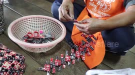 Thai woman makes home accessories from recycled coffee sachets