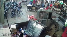 BEST VERSION: Dramatic moment sinkhole opens outside candy store in India, swallowing 10 people