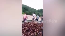 Entire house swept away by river after heavy rain in the Philippines