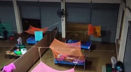 Covid-19 patients sleep in flooded Thai quarantine centre