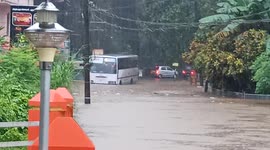 Watch -More than 40 in heroic action pulled out a passenger bus submerged in water with Passenger in Kottayam