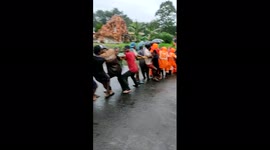 Watch -More than 40 in heroic action pulled out a passenger bus submerged in water with Passenger in Kottayam