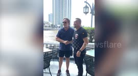 Russell Crowe finally meets 'hero' Thai cop who disarmed knife-wielding intruder with a HUG