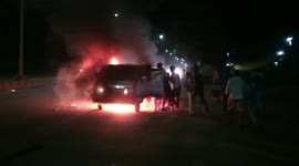 Van catches on fire amid road in central India