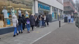 People queue for Primark to open after lockdown ends in Brighton