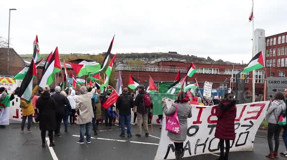 CORRETS: Pro-Palestine protesters stage a demonstration outside Manchester branch of Israeli defense company
