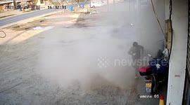 Tyre being inflated explodes dangerously close to Chinese mechanic