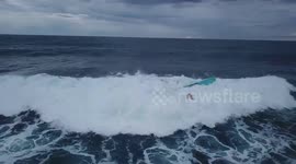 Drone captures huge 10ft wave smashing fisherman’s boat leaving him struggling for his life in the surf