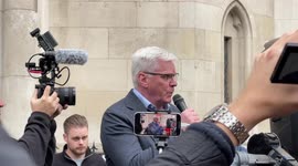 Kristinn Hrafnsson speaks outside Royal Courts of Justice