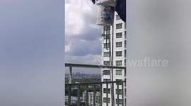 Thai woman cuts ropes of painters on high-rise apartment block because she was ‘annoyed at them outside her window’
