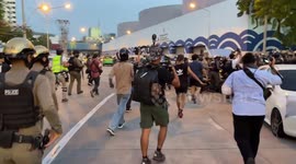 Protesters clash with police after death of boy, 15, at rally in Bangkok, Thailand