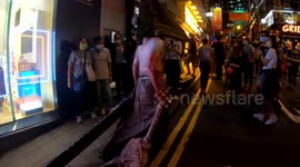 Revelers crowd Lan Kwai Fong in Hong Kong with costumes for Halloween