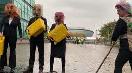 Climate Activists Stage Dirty Oil Protest Outside CoP26 Venue in Glasgow Ahead of UN Climate Change Conference