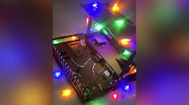 Mum and daughter make miniature DIY house out of cardboard in China