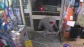 Police release footage of RAM RAID where three men stole £1,500 of cigarettes, alcohol, razor blades and football cards – before dangerous police chase