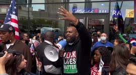 Anti Vaccine Protesters gather outside the Barclays center to support Kyrie Irving