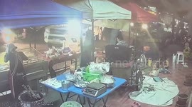 Empty car rolls into market stall after driver forgets to pull brakes