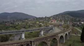 Drone footage of a train passing the bridge in Ukraine. Vorokhta