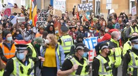 Fridays For Future Galsgow COP26 Protesters March Along Road with Huge Banner