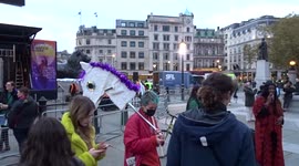 Adetola Anamade of Global Majority VS UK Government campaign speaking at climate protest in Trafalgar Square