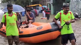 Elderly people and women were rescued in boats as their houses were  surrounded by floods in South India.