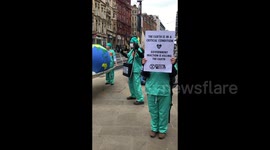 Extinction Rebellion perfomance in Glasgow, UK