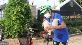 Grandmother takes pet chicken to exercise with her in Thailand