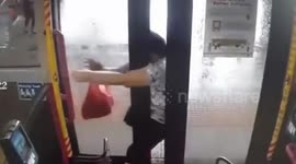 Bus doors close on elderly woman in Singapore