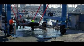 Dinghies being transported away from the docks in Dover