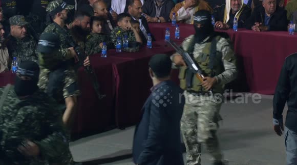 Palestinian militant group show off new rocket launchers to cheering