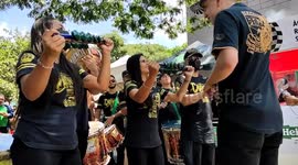 Fans arrive at the entrances of the Autodromo de Interlagos, São Paulo, Brazil