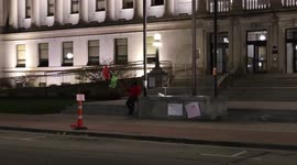 Justin Blake, Jacob Blakes cousin sits alone after all the protesters leave in front of the courthouse in Kenosha