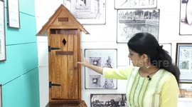 An Employee of Sulabh International Organization explain the replica made in USA   of 1920  oldest & unique method of using double storyed Toilet at Toilet Museum in Delhi.