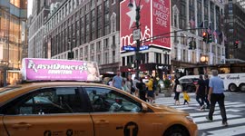 People crossing the sixth avenue in front of macy's in new york