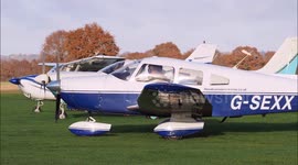 Plane with very distinctive registration takes off at Headcorn in Kent, UK