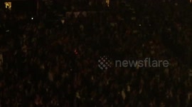 Amazing glowstick air drumming skills at concert