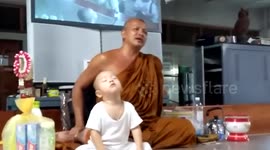Cute little monk in Thailand