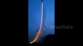 Amazing ladder of fireworks rises into sky